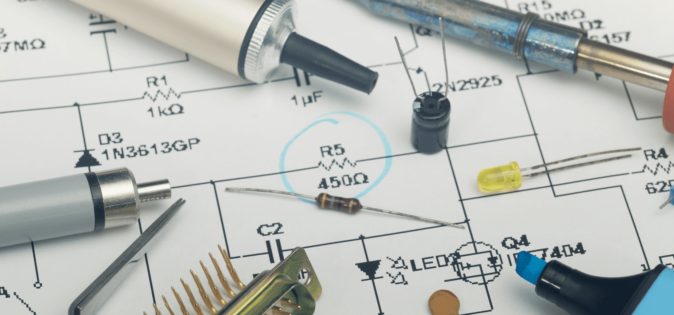 Custom-designed PCB prototype on a workbench.